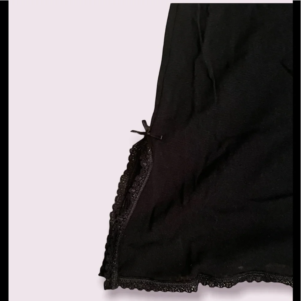 Sheer black negligeé with lace trim